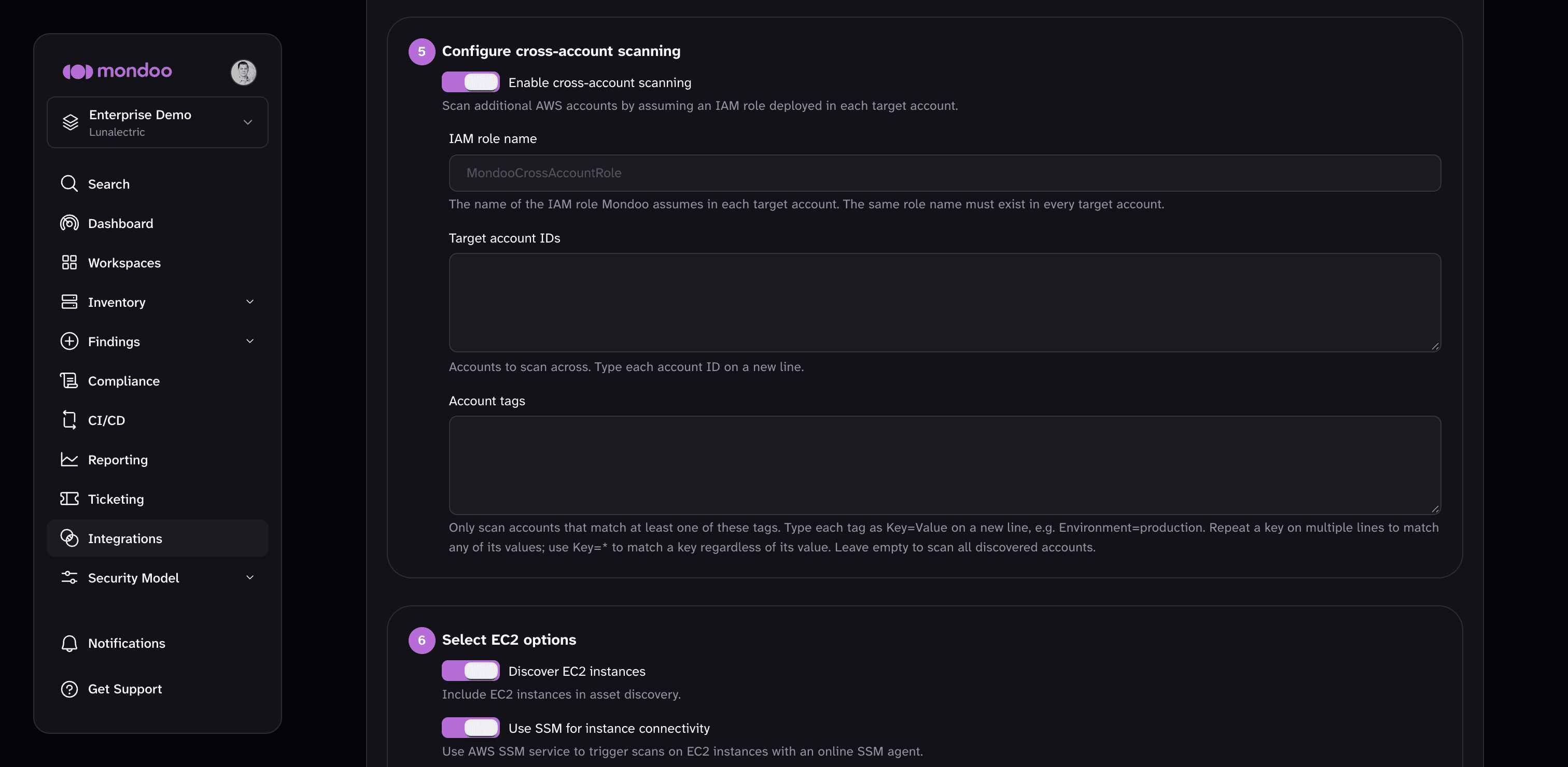 Cross-account scanning settings in the serverless AWS integration form: IAM role name, target account IDs, and account tags