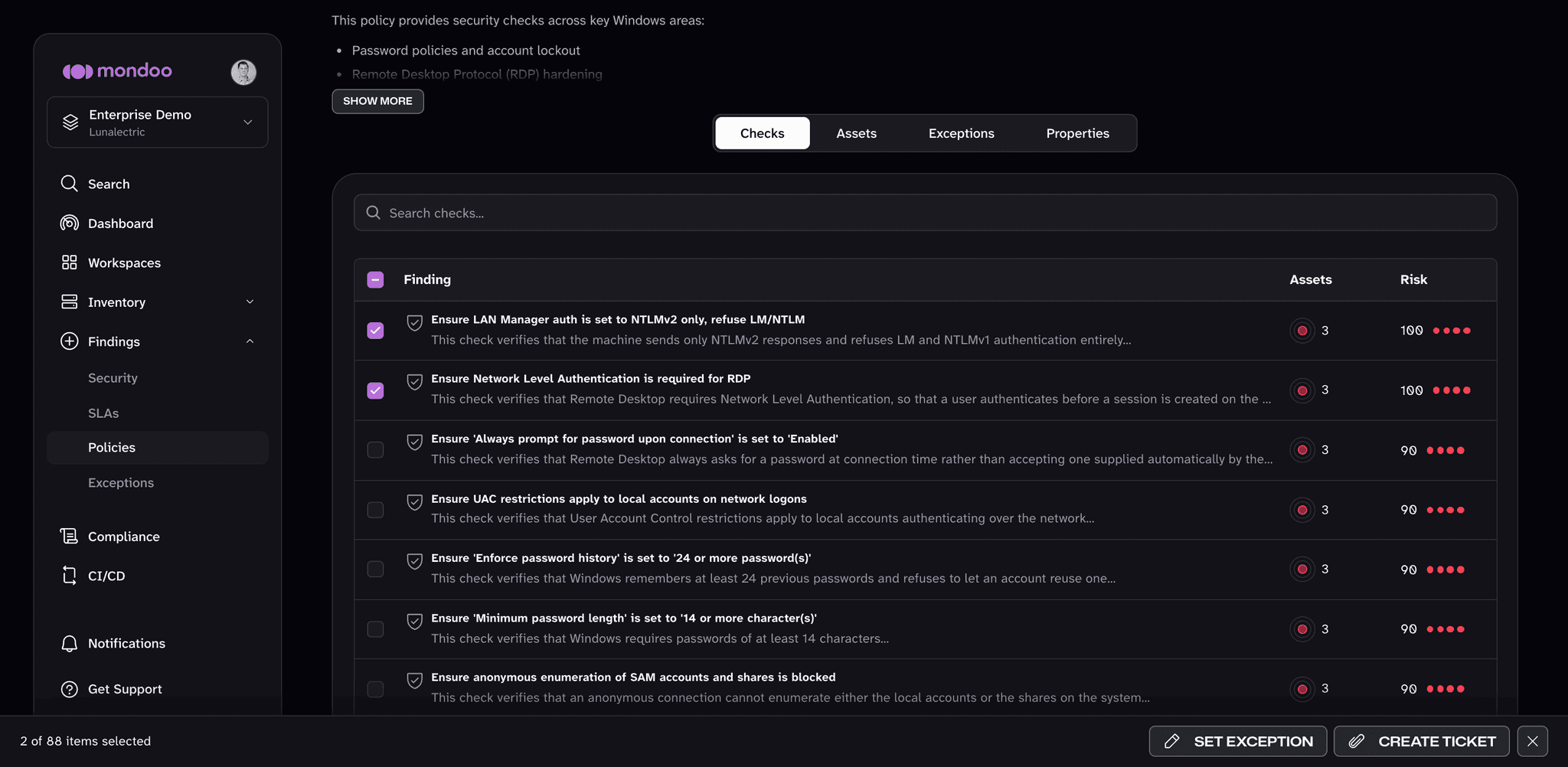 Two checks selected on a policy's Checks tab in the Mondoo App, with the SET EXCEPTION button in the toolbar at the bottom of the page