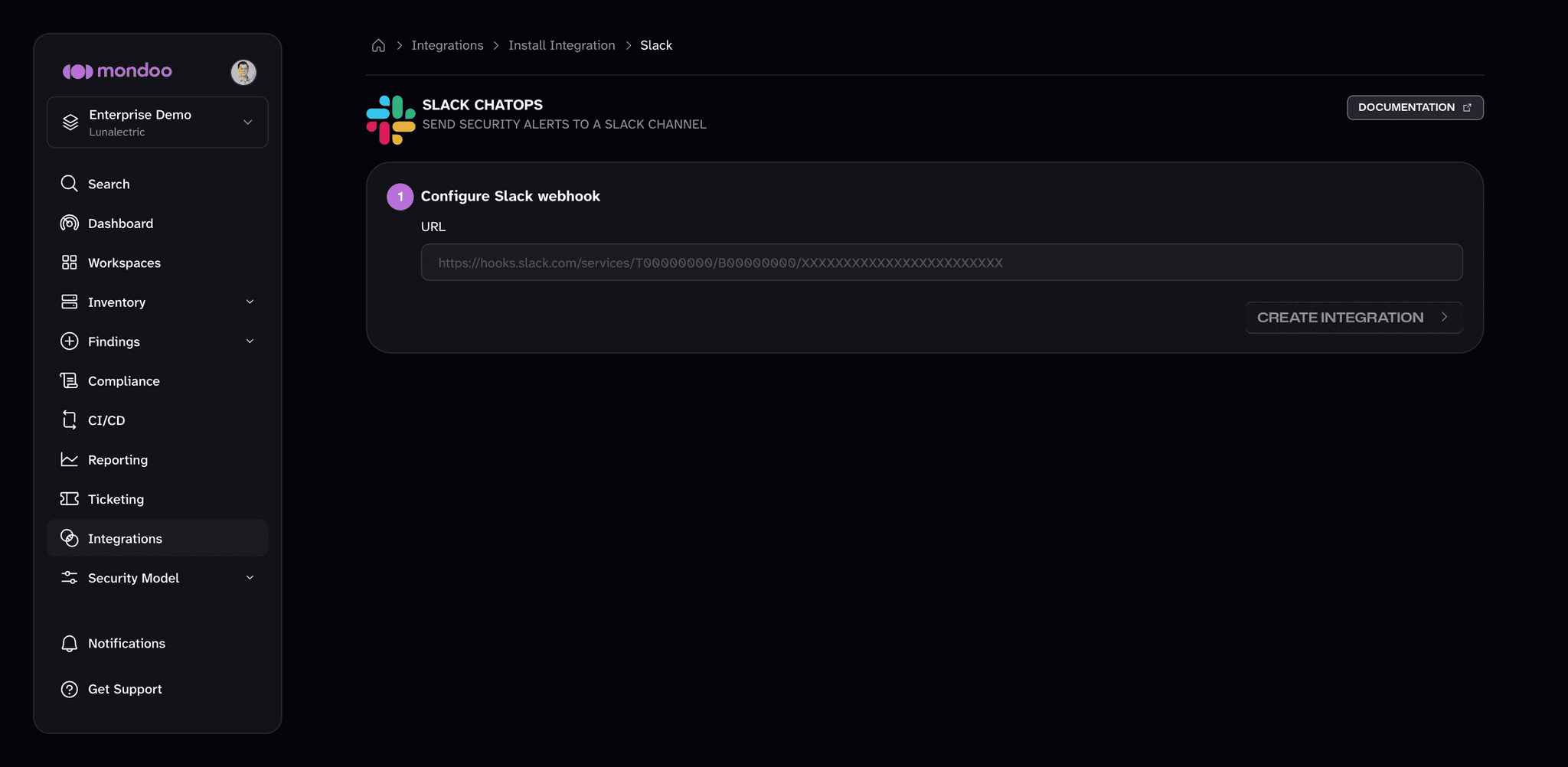 The Slack ChatOps setup page in Mondoo, with a URL box for the Slack webhook and a Create Integration button