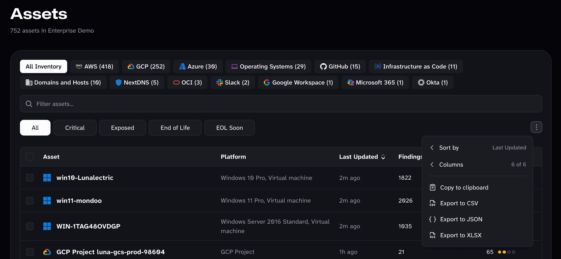 The export menu on the Mondoo App assets table, with Copy to clipboard and Export to CSV, JSON, and XLSX options